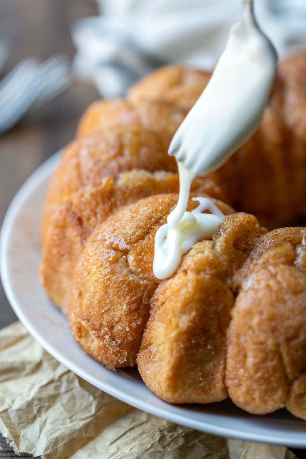 Glaze drizzling onto monkey bread