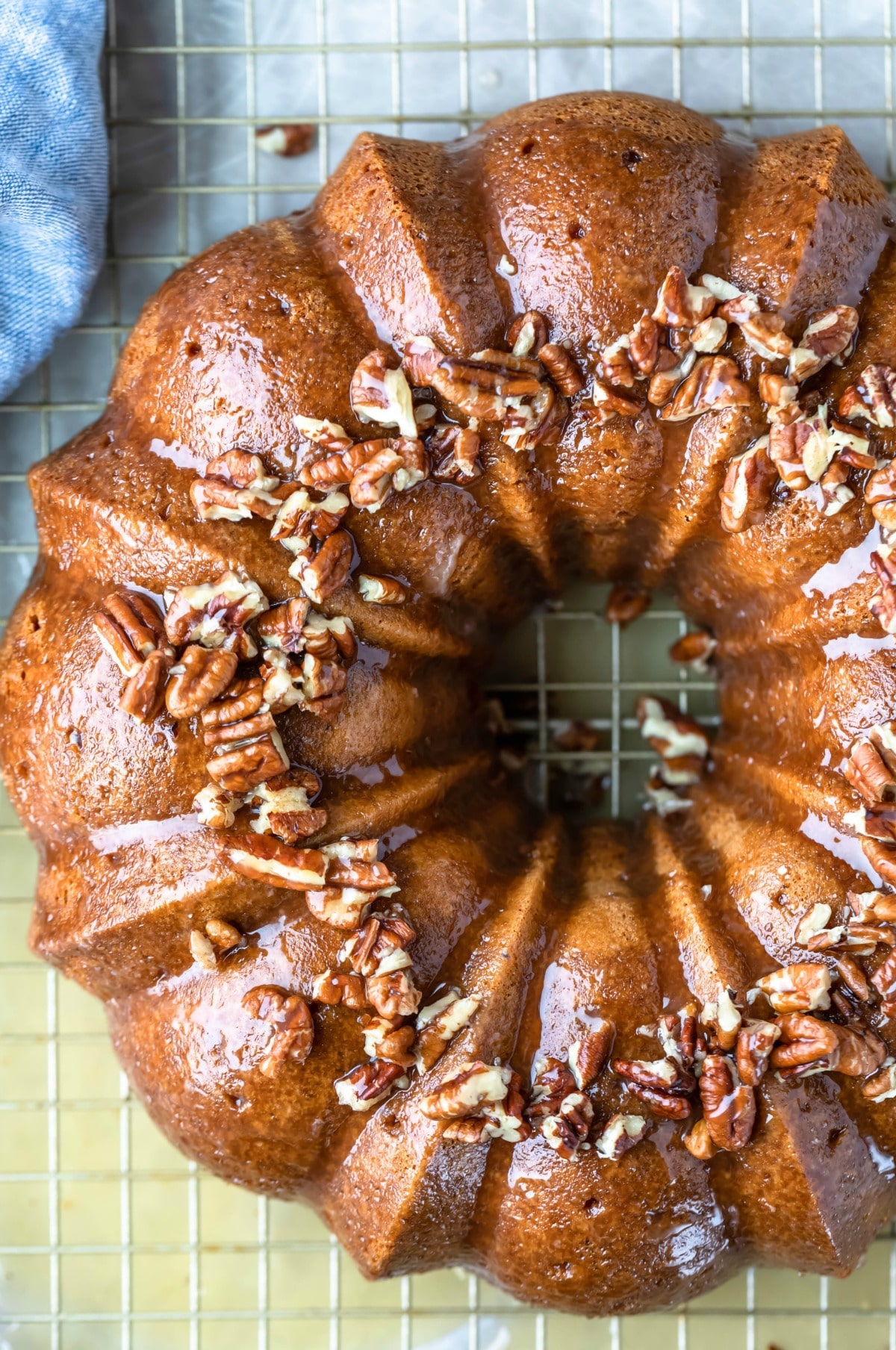 Irish cream bundt cake topped with pecans