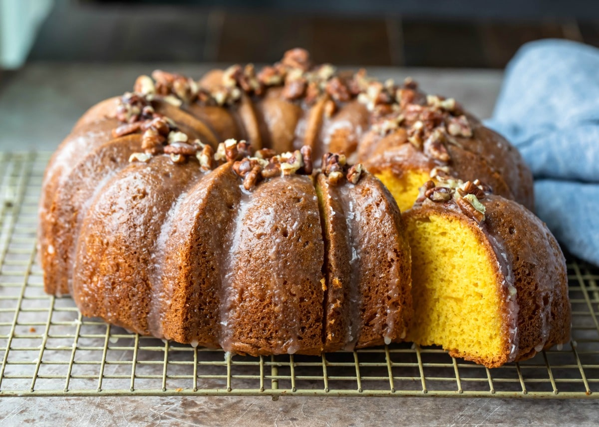 Irish Cream bundt cake with a slice coming out of it