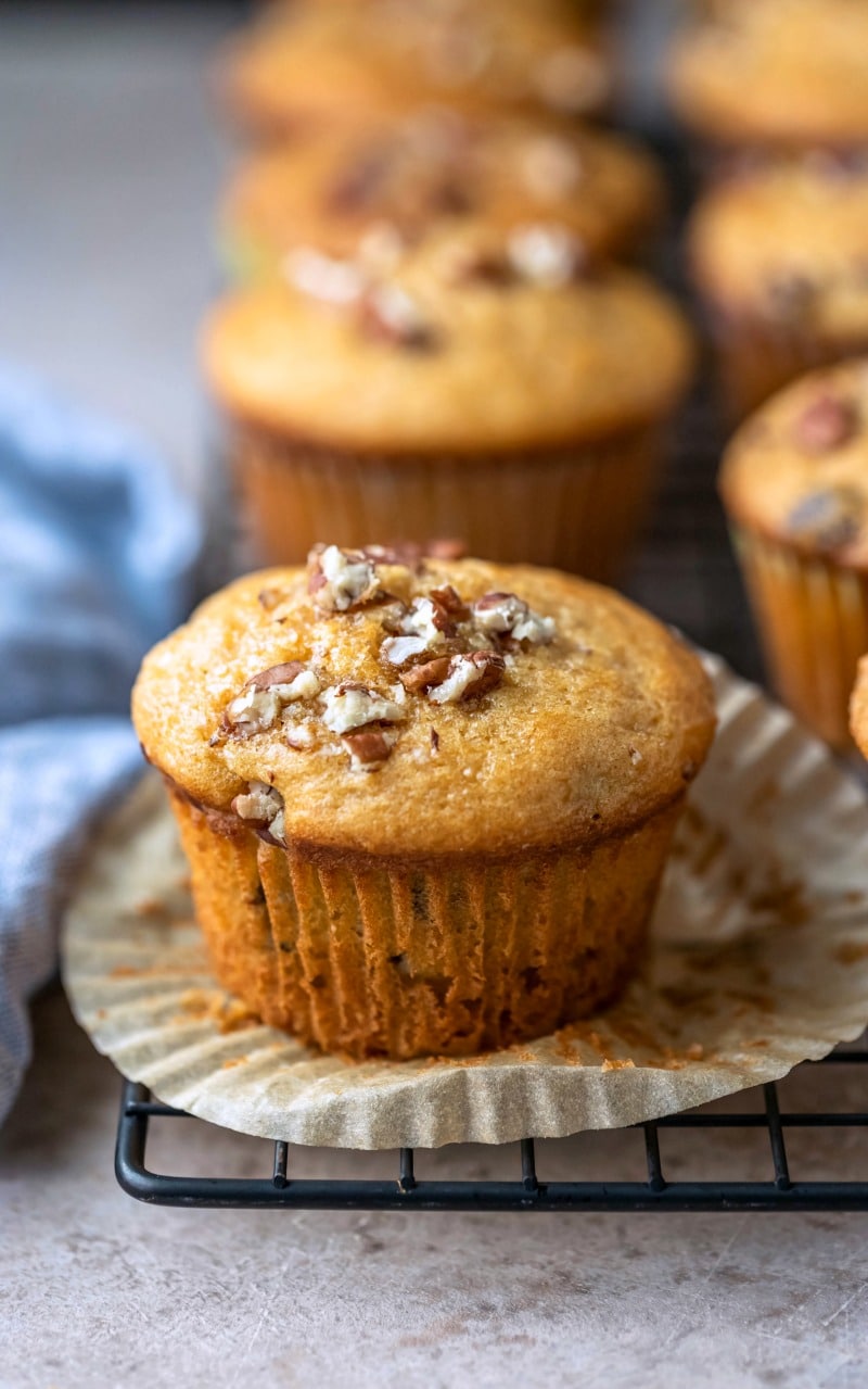 Yogurt muffin on a black wire cooling rack