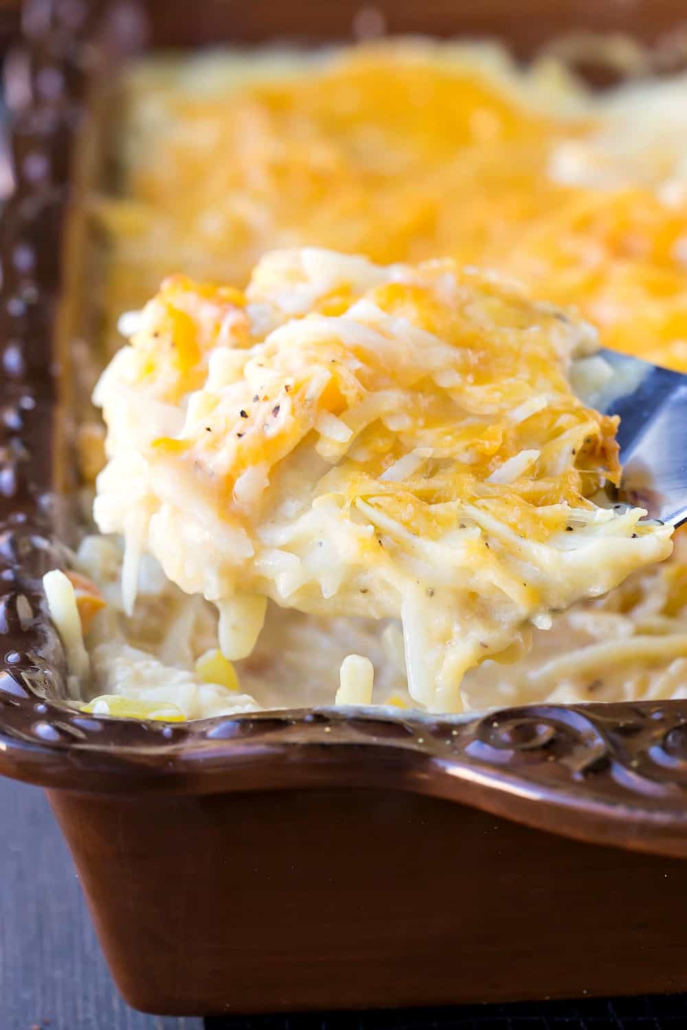 Cheesy Hash Brown Chicken Bake on a spatula 