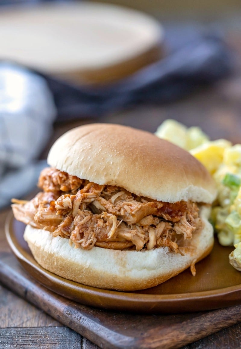 Crock Pot bbq chicken shredded on a hamburger bun