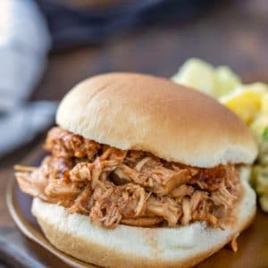 Crock pot bbq chicken on a sandwich bun