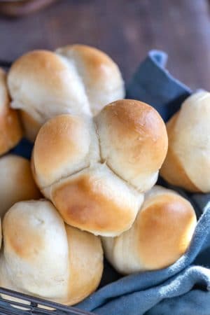 Big soft dinner rolls in a basket