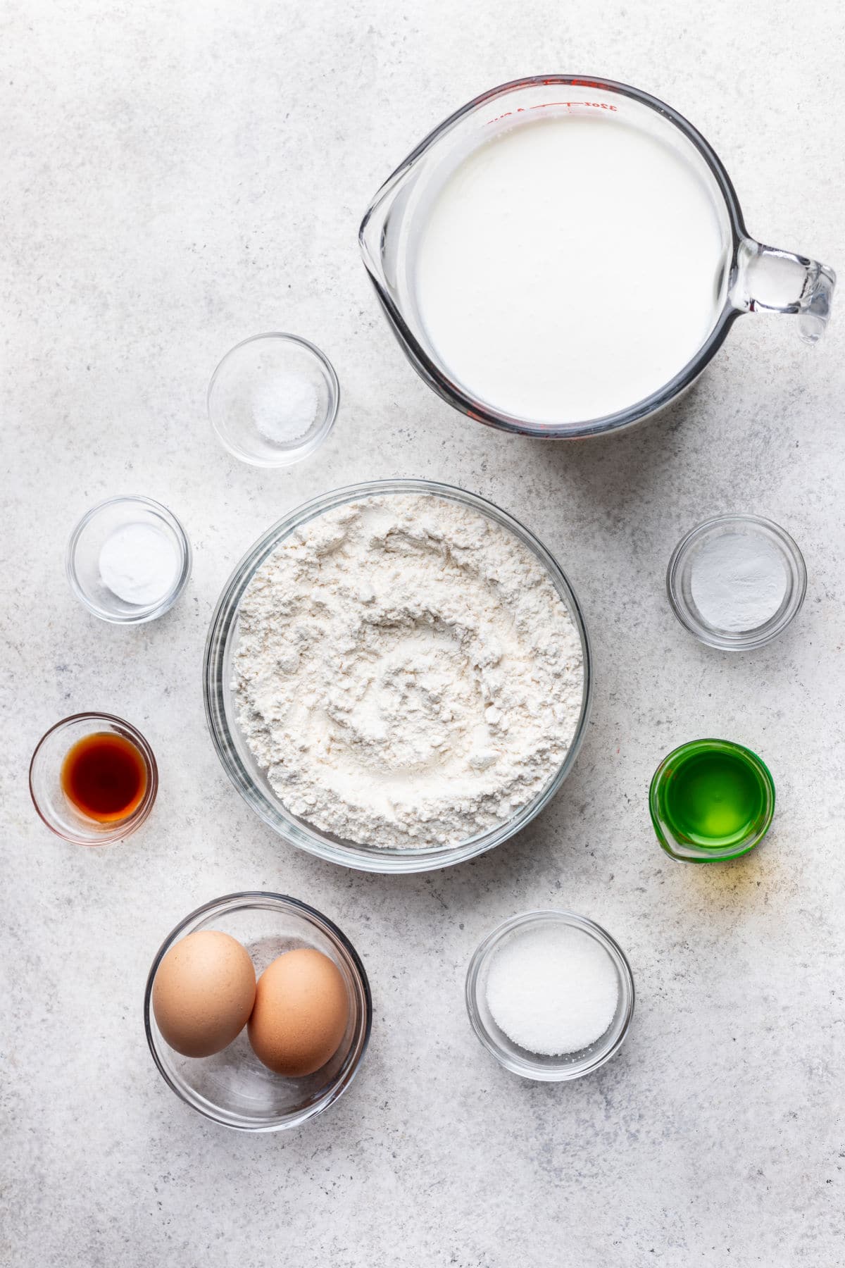 Ingredients for buttermilk pancakes in dishes.