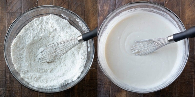 White cupcake batter in a glass mixing bowl