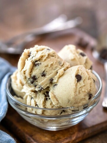 Scoops of edible cookie dough in a glass bowl