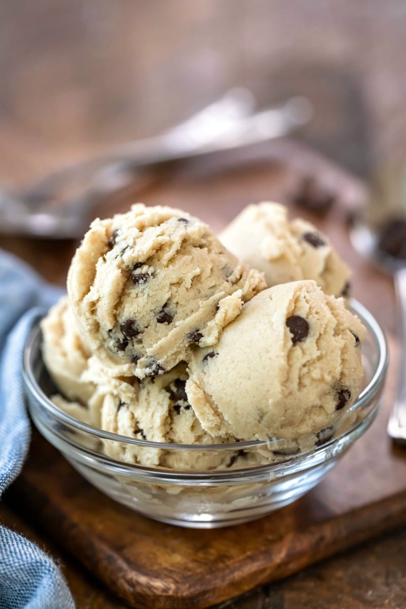 Scoops of edible cookie dough in a glass bowl