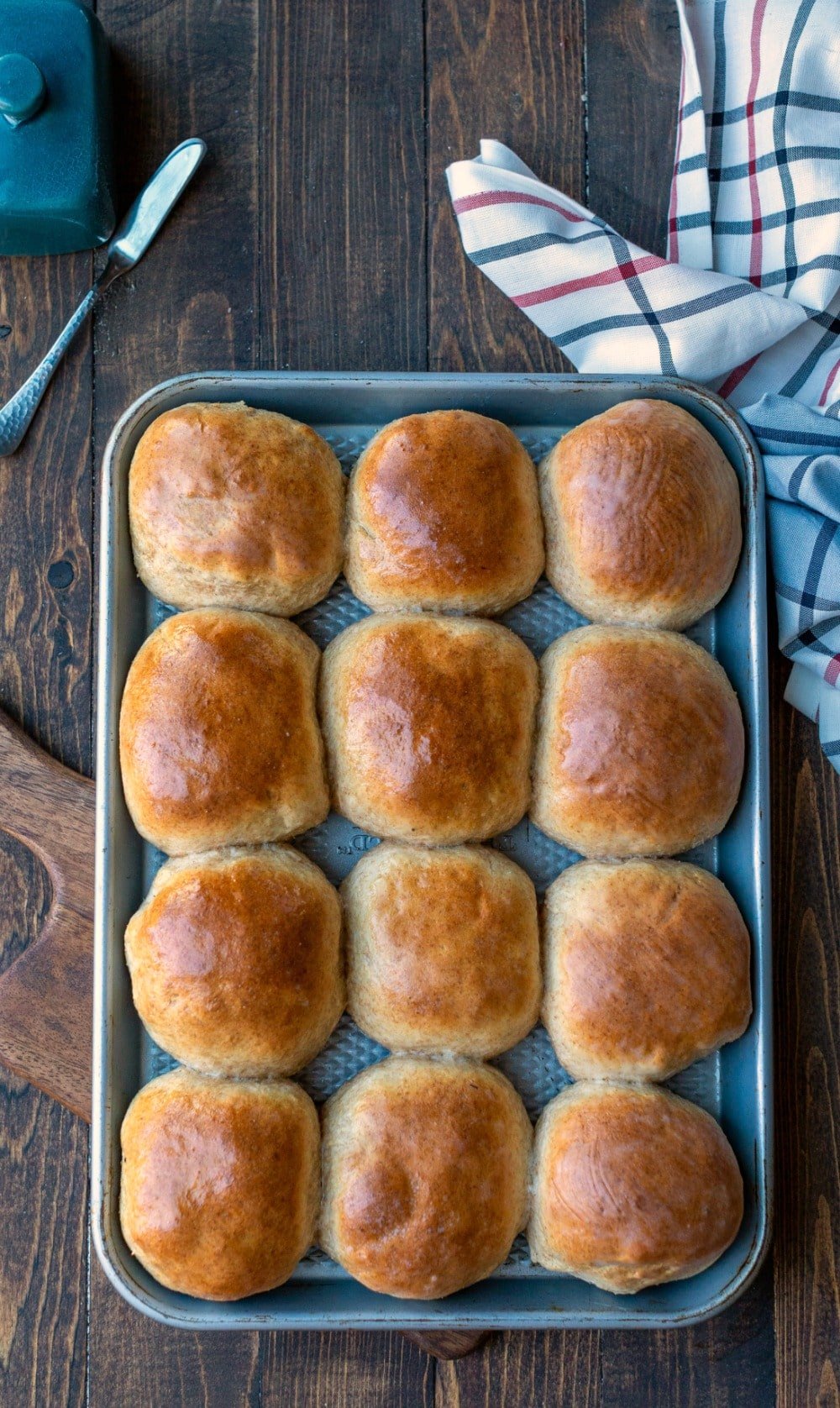 30 minute honey wheat rolls on a baking tray