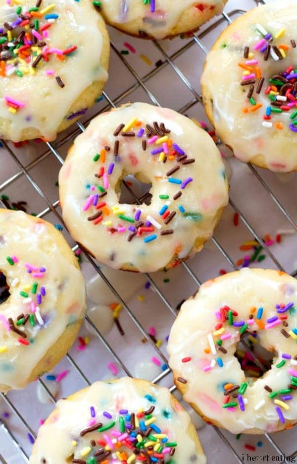 Baked Funfetti Donuts on a wire cooling rack