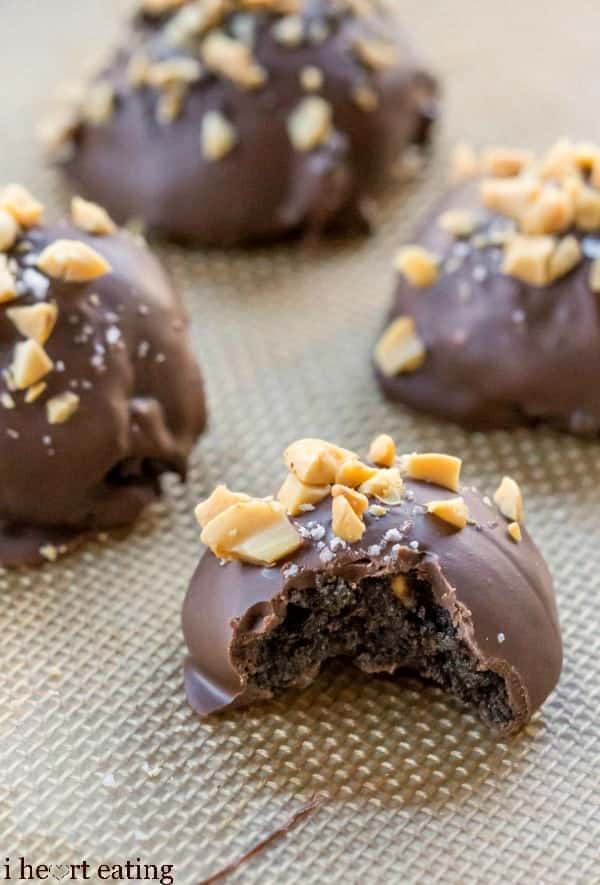 Peanut Butter Oreo Cookie Ball with a bite missing