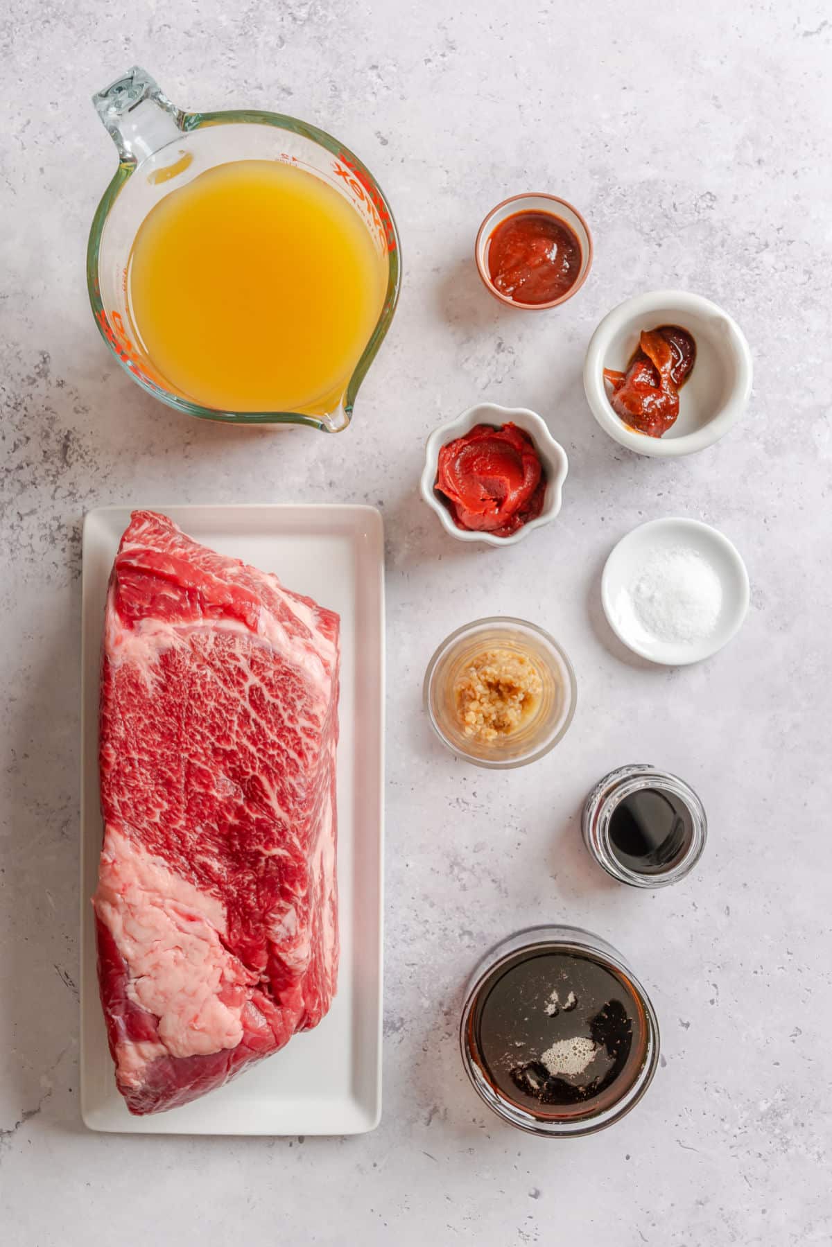 Ingredients for slow cooker pineapple chipotle beef in dishes.