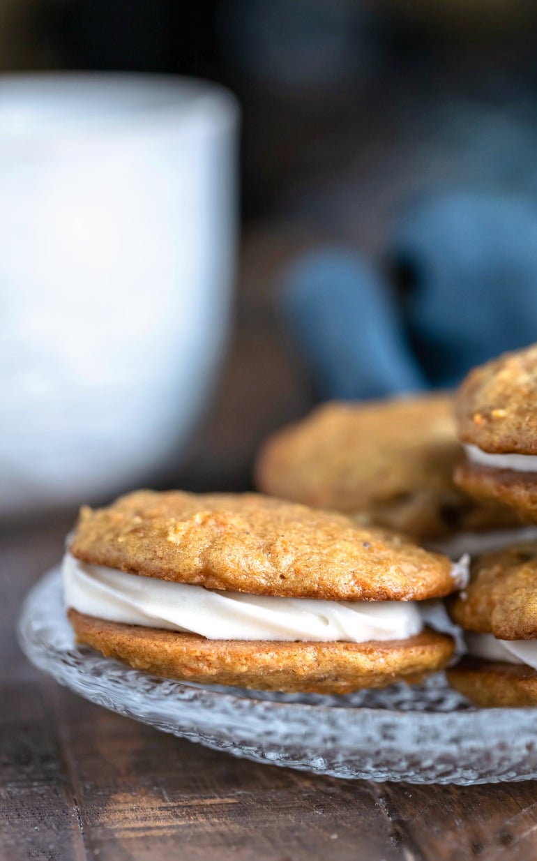 Carrot Cake Sandwich Cookies on a glass plate