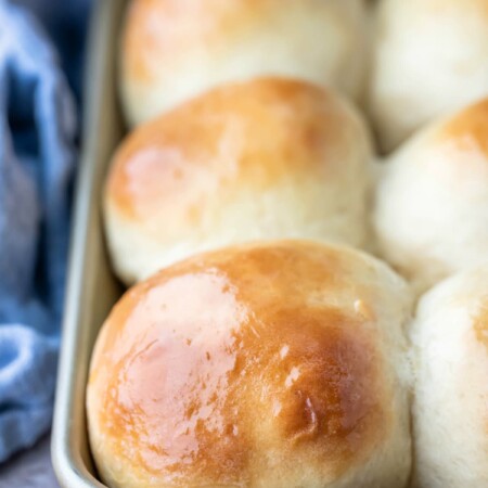 Gold baking pan with 30 minute honey butter rolls in it