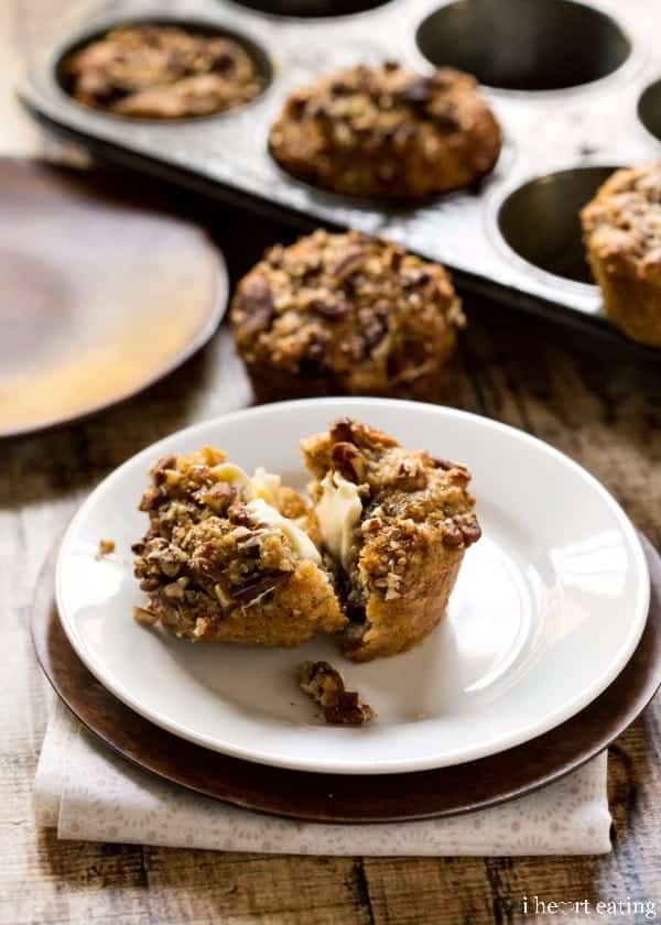 Oatmeal Raisin Bran Muffin cut in half with butter on it