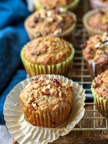 Oatmeal Raisin Bran Muffin on a gold cooling rack