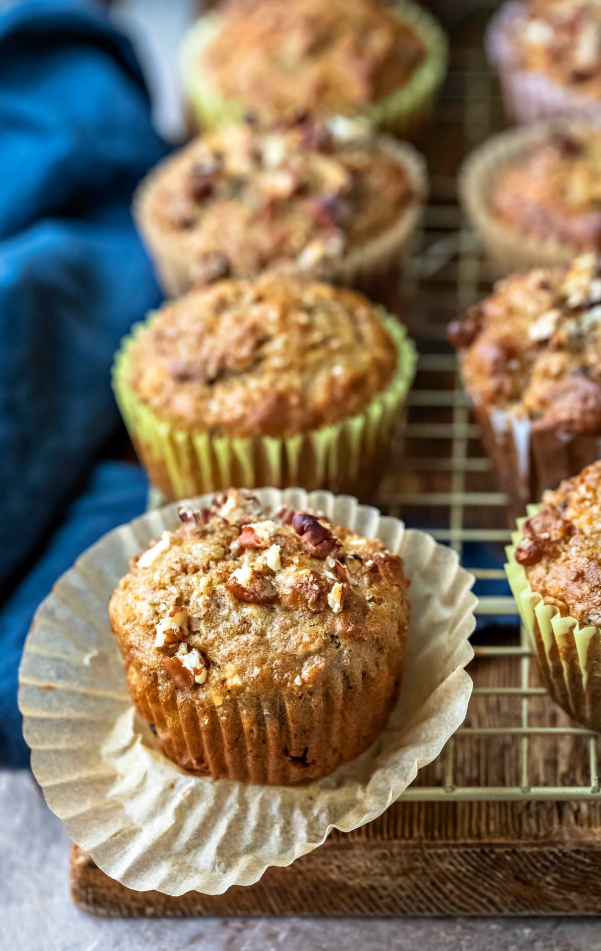 Oatmeal Raisin Bran Muffin on a gold cooling rack