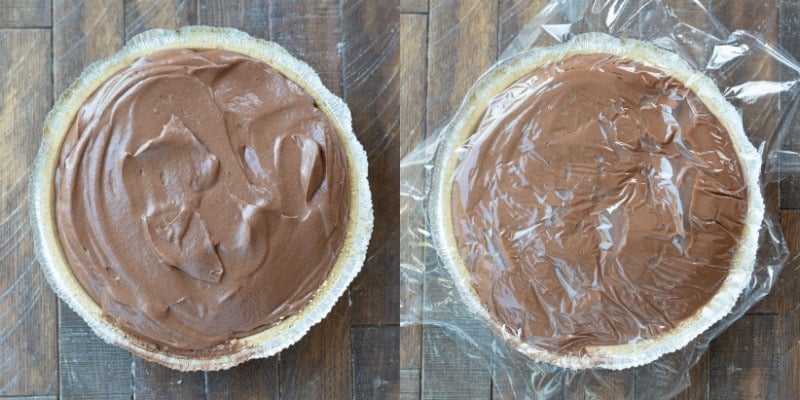 S'mores pie with a piece of plastic wrap pressed onto the surface