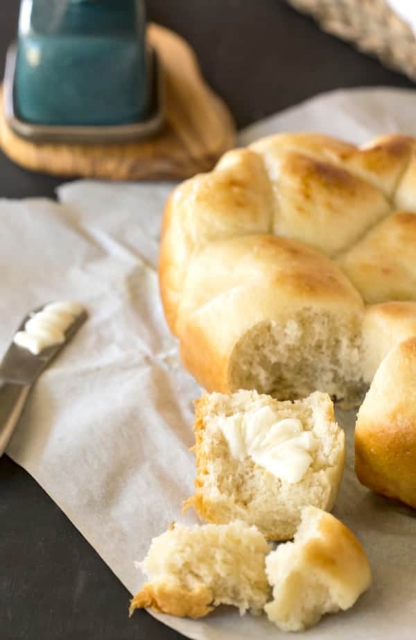 Slow Cooker Dinner Rolls on a piece of white parchment paper