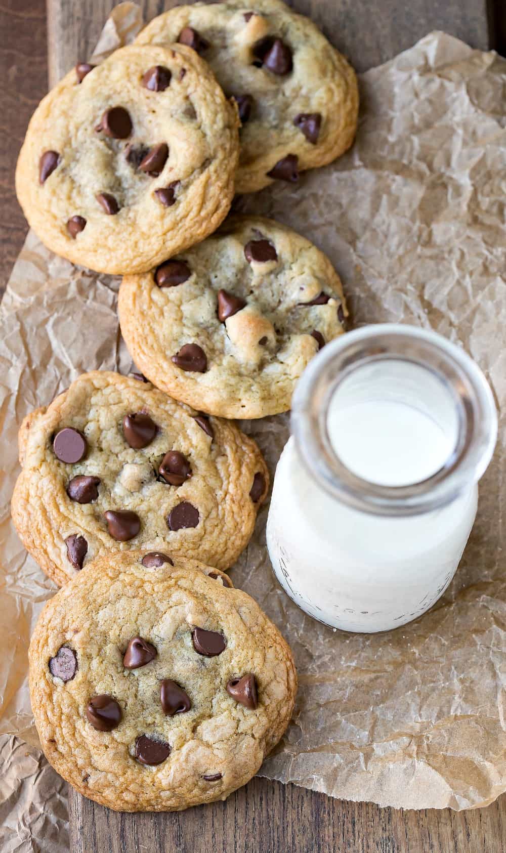 Chewy Brown Sugar Chocolate Chip Cookies next to a cup of milk.
