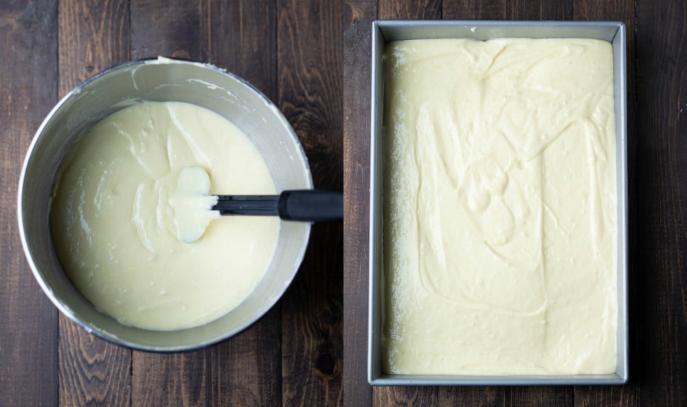 White cake batter in a silver mixing bowl