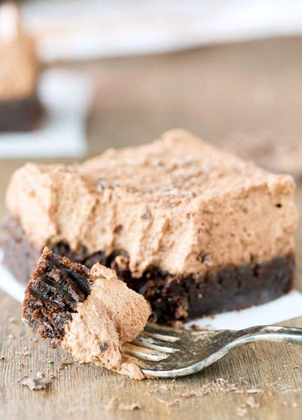 Bite of Chocolate Mousse Brownie on a silver fork