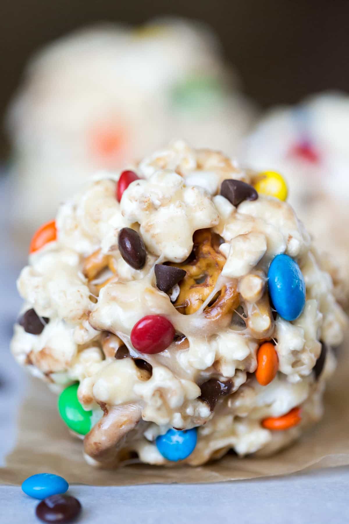 Popcorn ball on a sheet of brown parchment paper