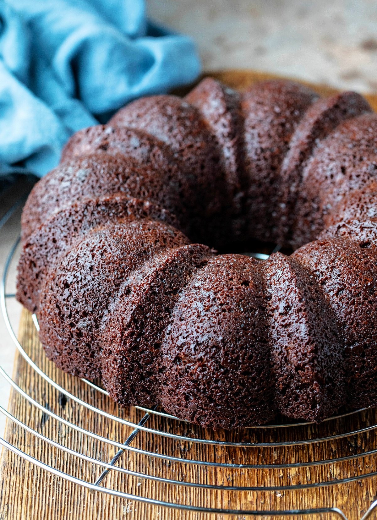 Chocolate bundt cake on a wire cooling rack
