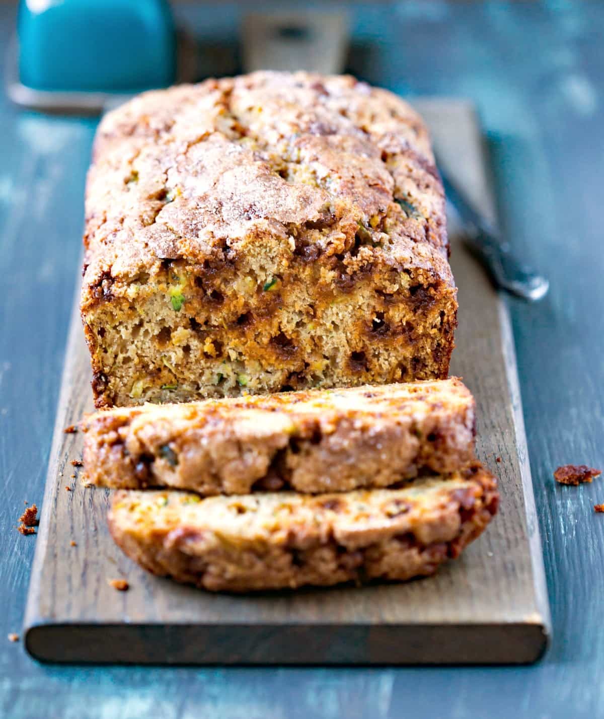 Sliced loaf of Cinnamon Chip Whole Wheat Zucchini Bread