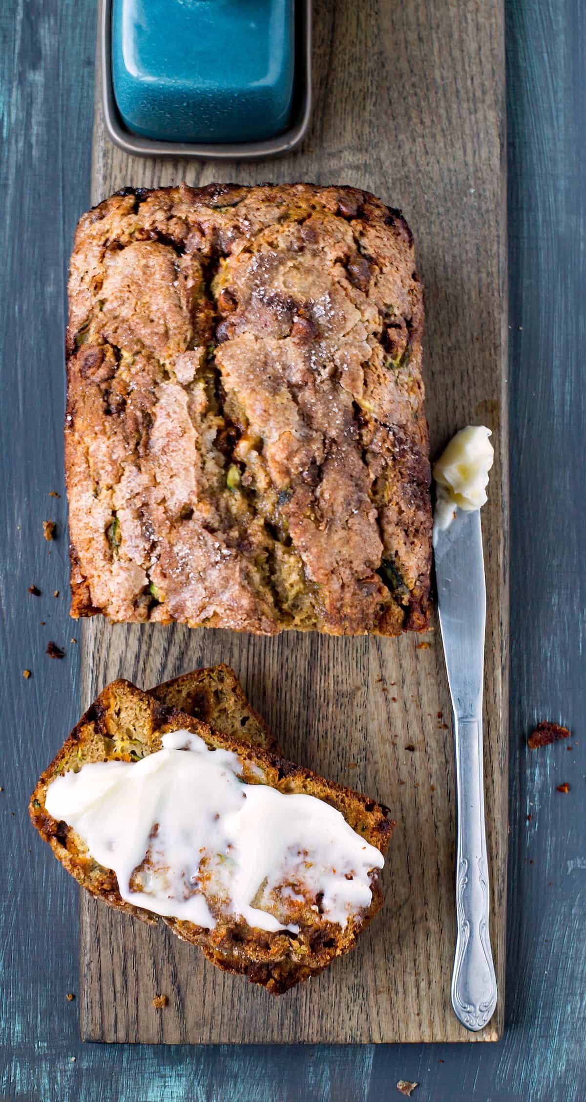 Cinnamon Chip Whole Wheat Zucchini Bread on a wooden cutting board