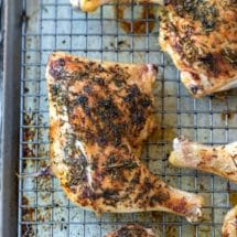 Herb roasted chicken on a baking sheet