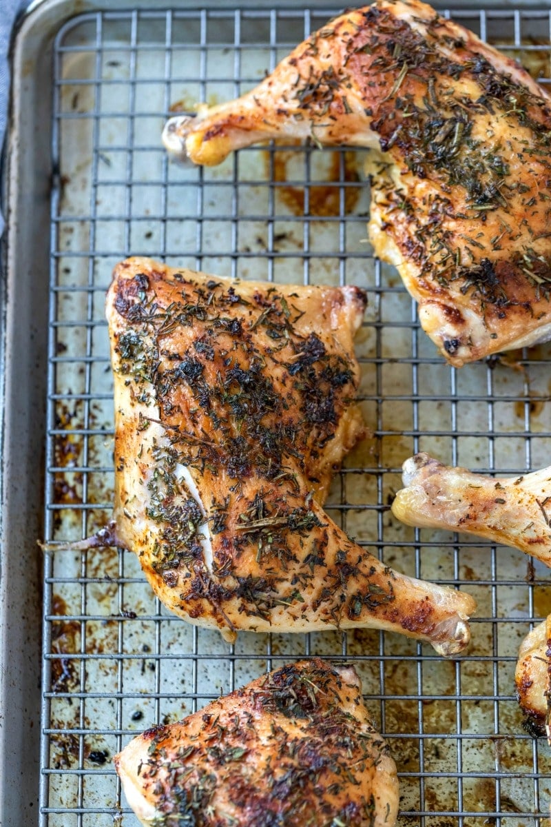 Herb roasted chicken on a baking sheet