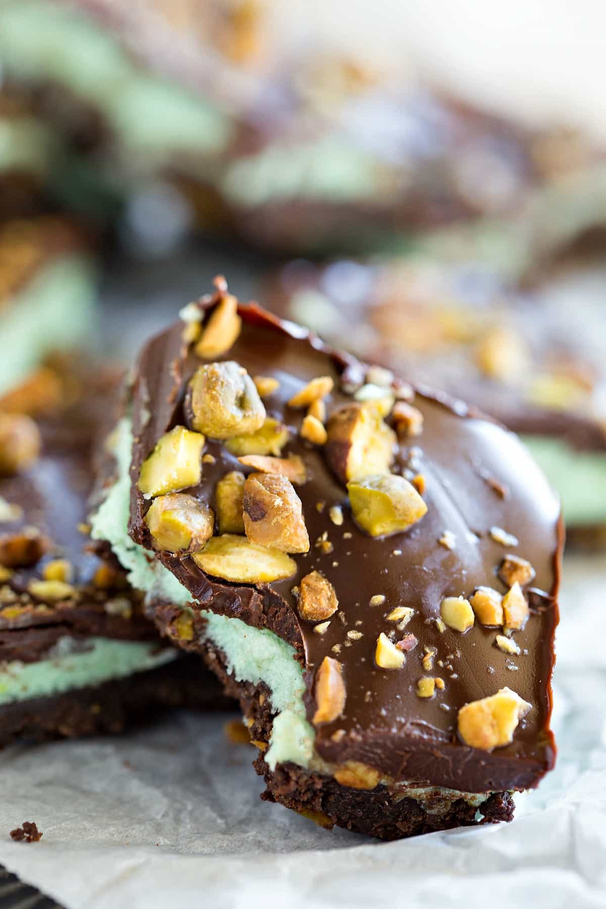No Bake Pistachio Bar on its side with a bite missing from it. 