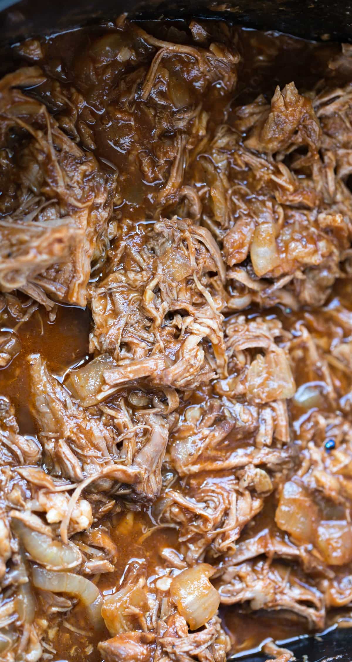 Slow Cooker Barbecue Beef in a crock pot insert