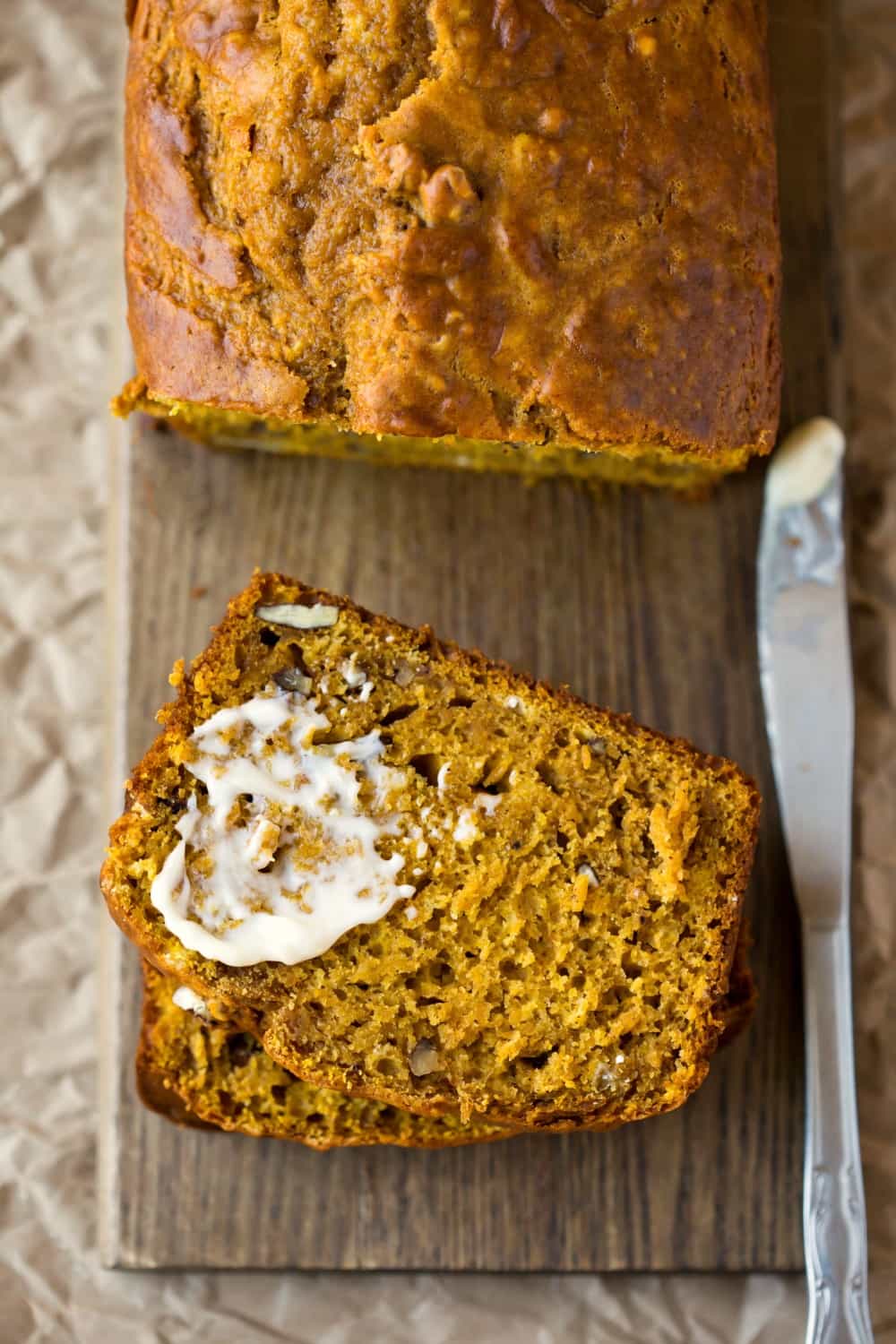 Half-buttered slice of buttermilk pumpkin spice bread