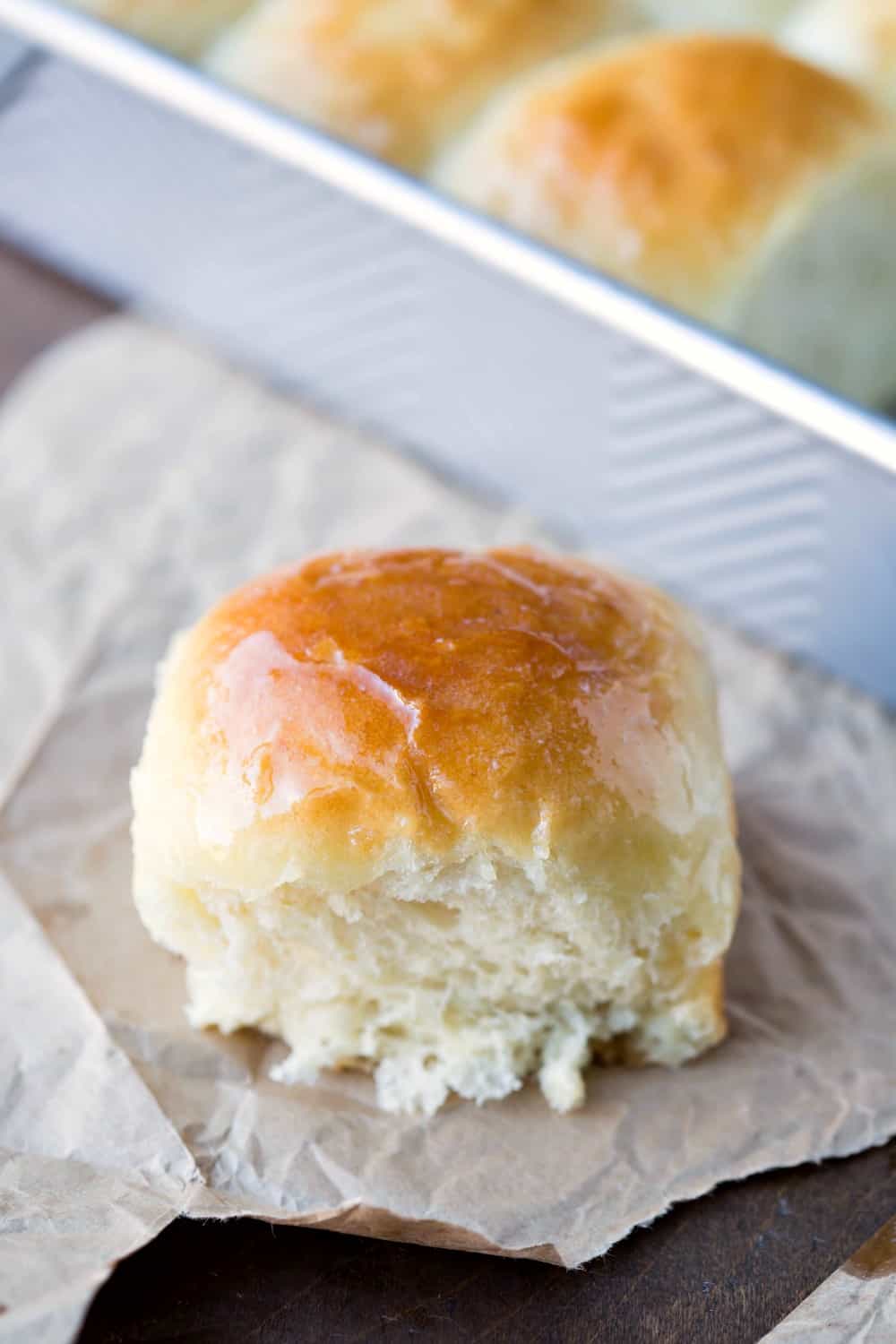Amish Dinner Roll on a piece of brown parchment paper. 
