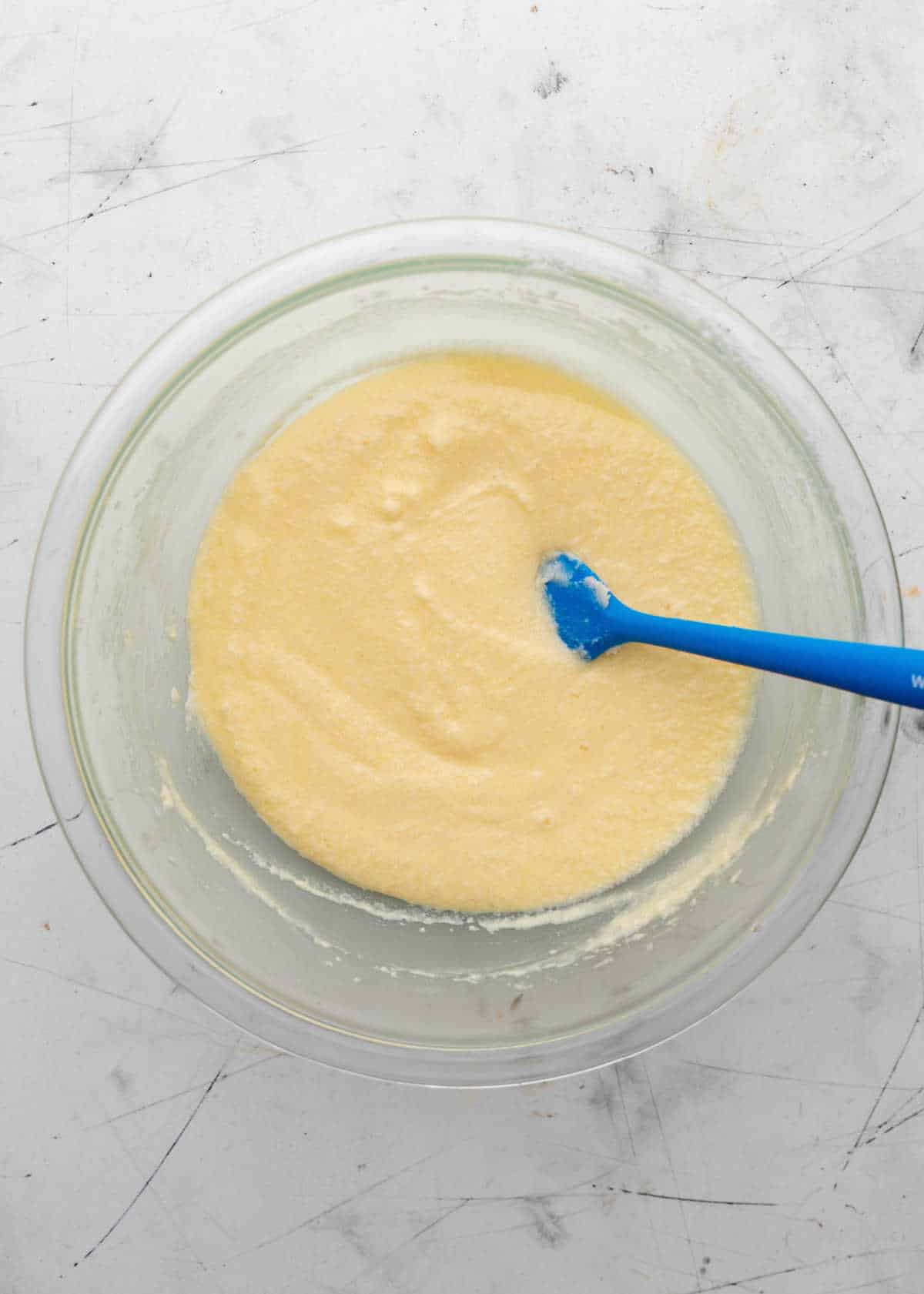 Buttermilk mixed into cake batter mixture.