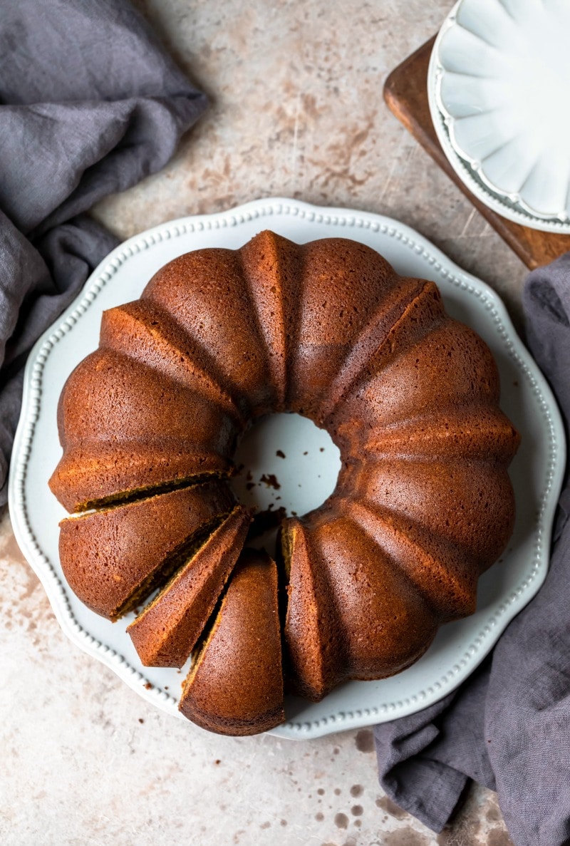 Pumpkin marble cake with slices cut on a white platter