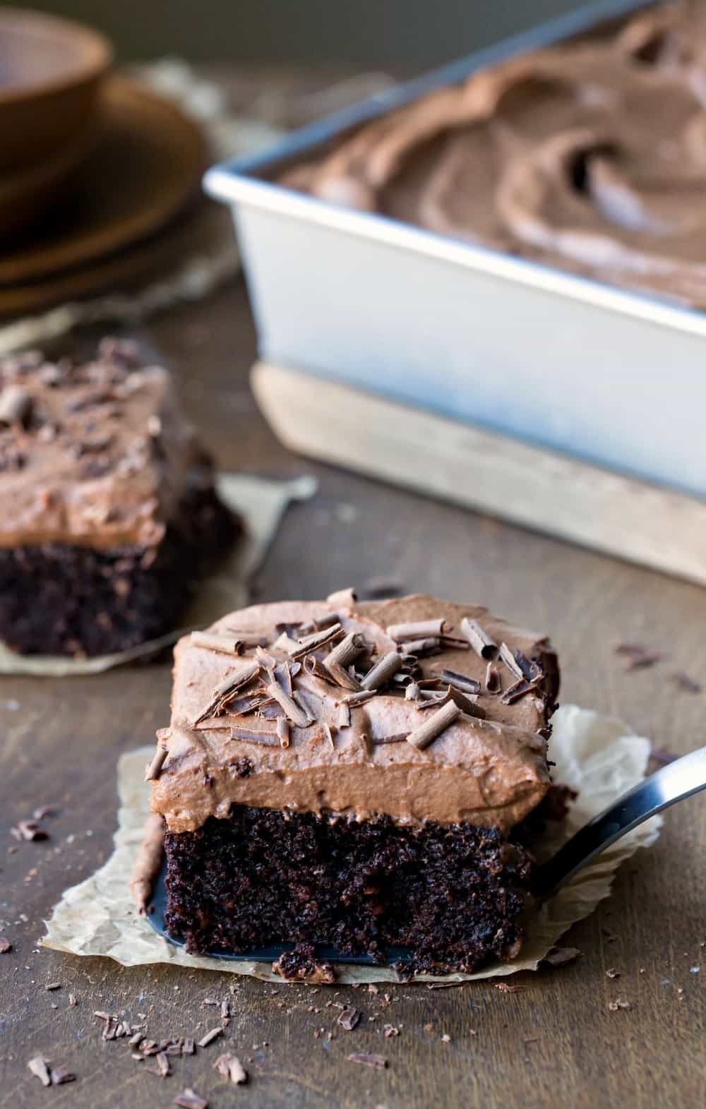 Slices of Chocolate Mousse Cake on a wooden surface