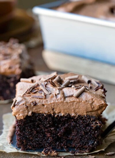 Chocolate Mousse Cake in front of a pan of cake.