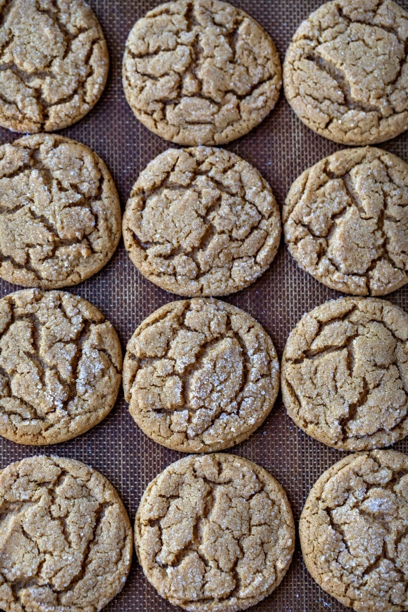 Molasses cookies on a silicone baking mat