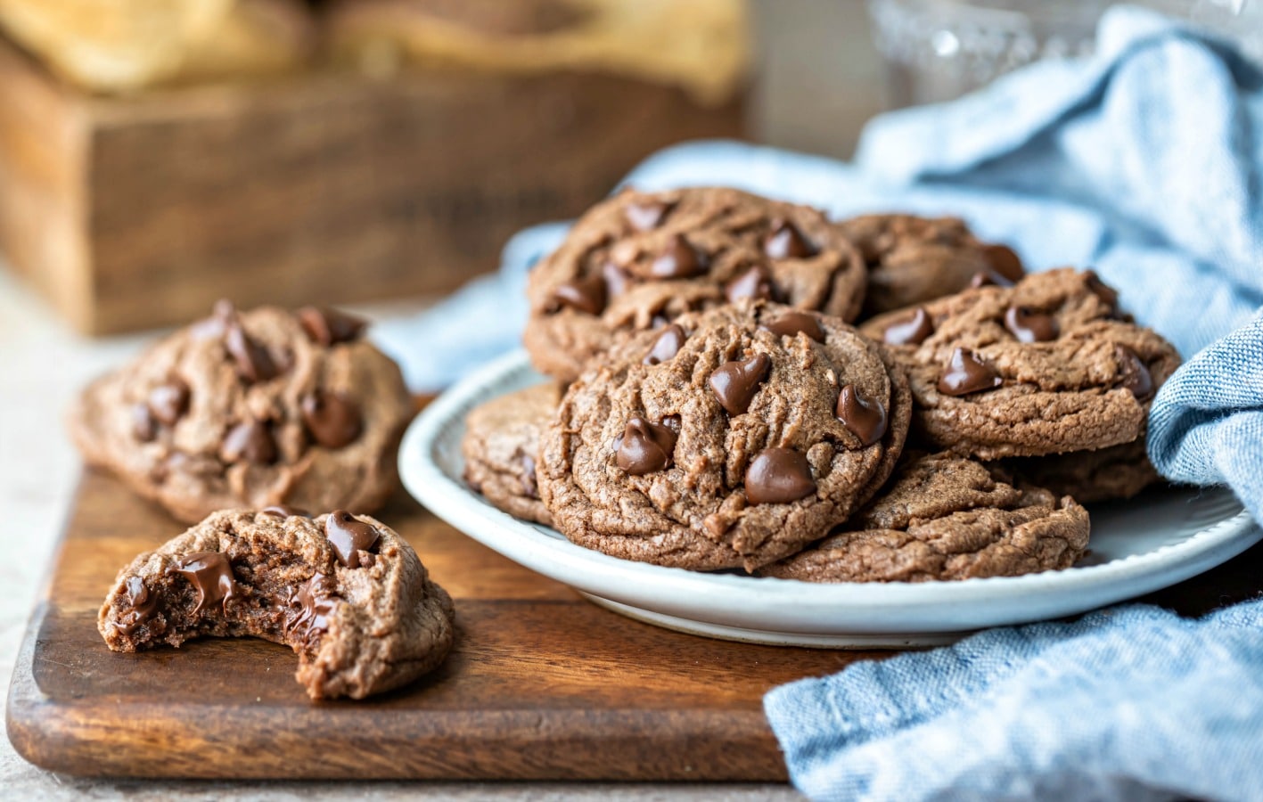 Plate of Nutella cookies next to a cookie with a bite missing