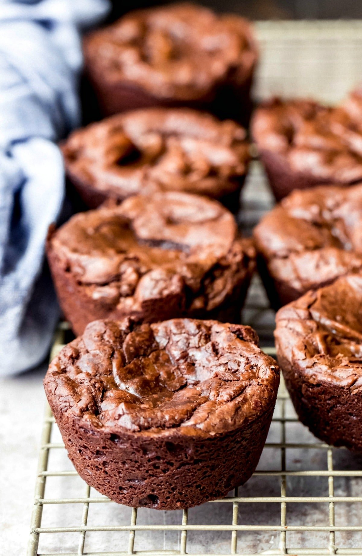 Brownie bites on a gold wire cooling rack