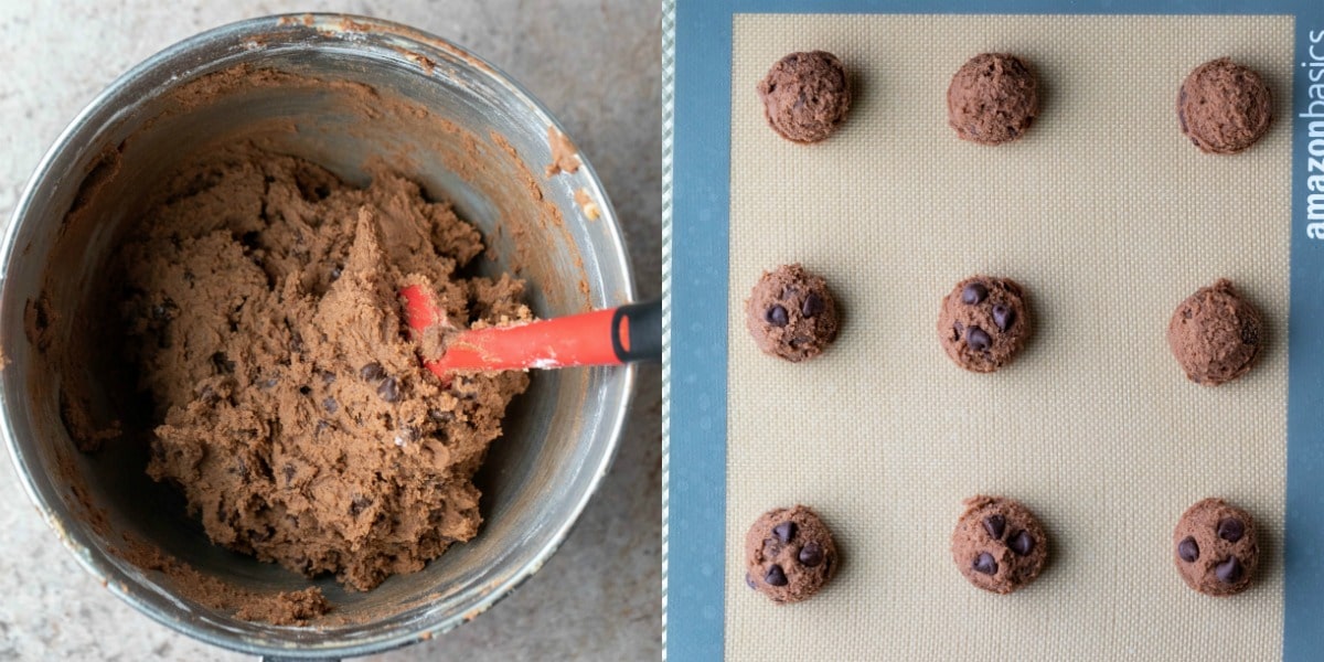 Scoops of chocolate chocolate chip pudding cookie dough on a baking sheet