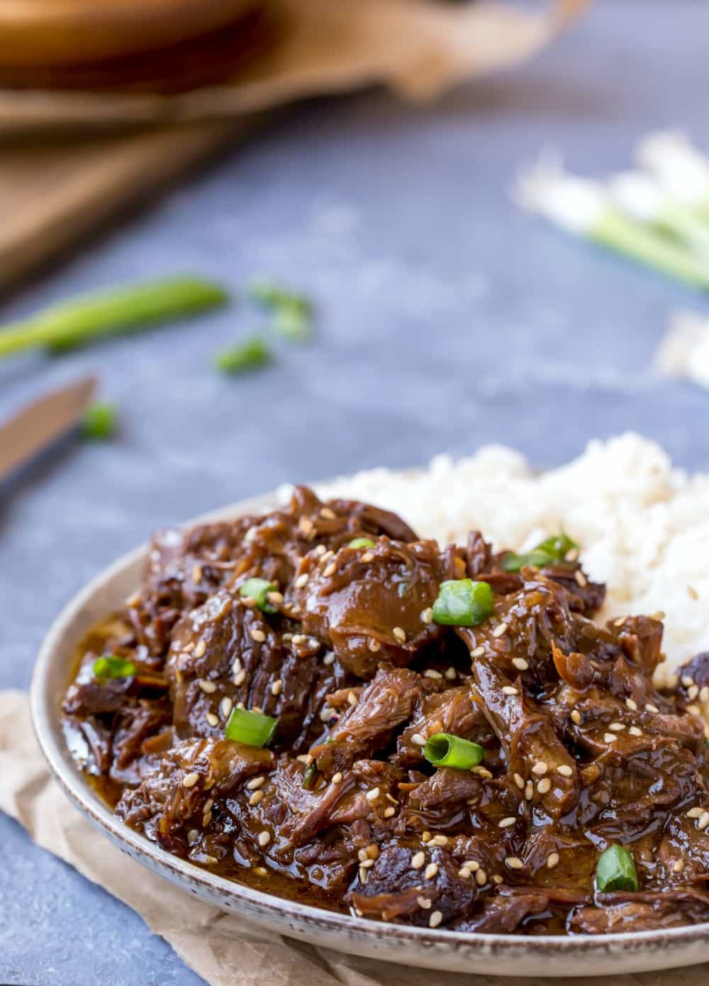 Slow Cooker Korean Beef and rice in a gray dish 