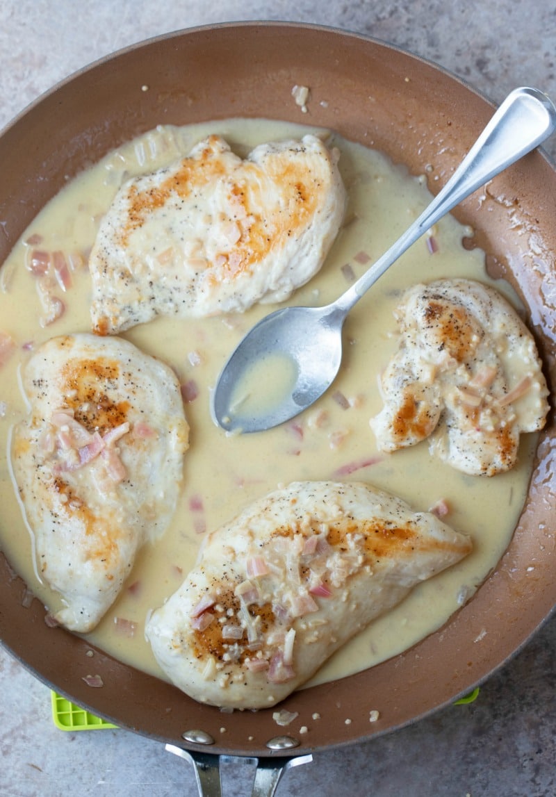 Lemon garlic chicken in a copper skillet