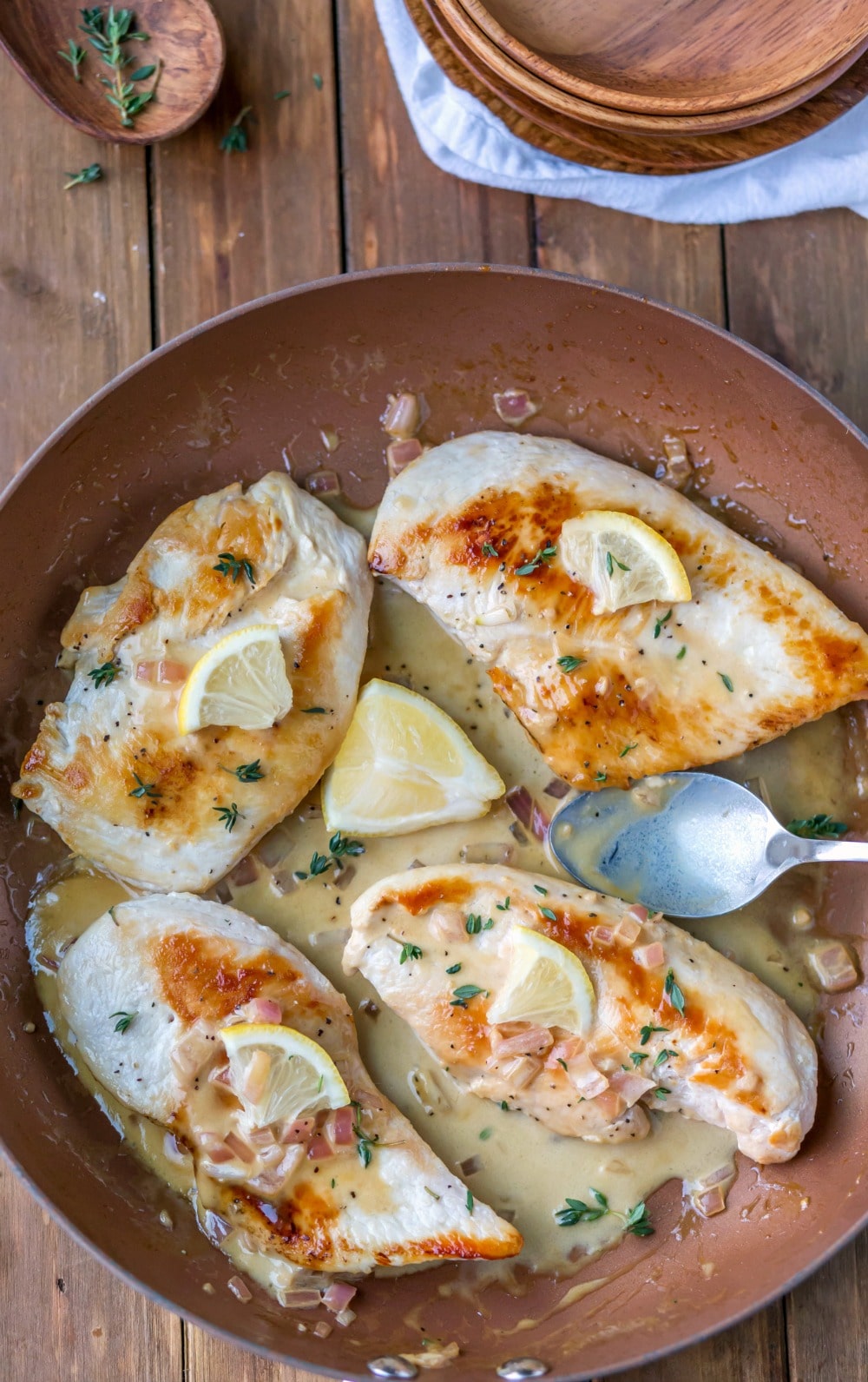 One Skillet Creamy Lemon Garlic Chicken in a copper skillet