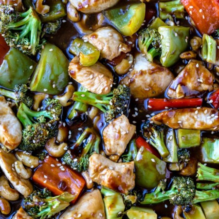 Close up photo of sheet pan cashew chicken and vegetables.