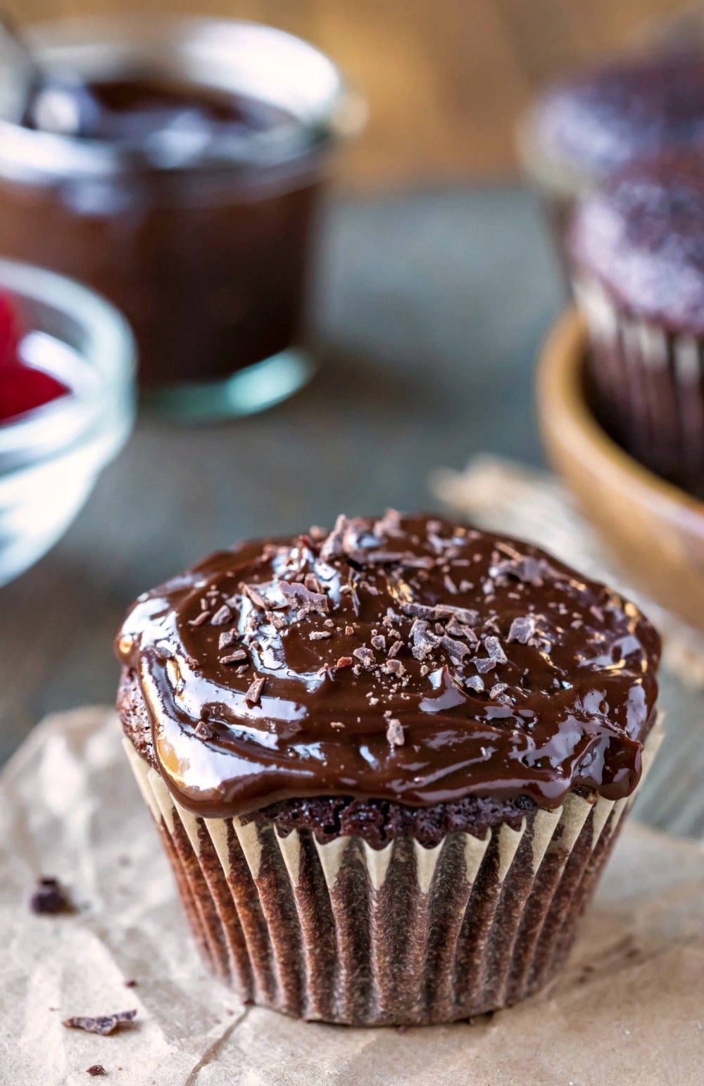 Chocolate Boston Cream Pie Cupcake near ganache and cupcakes