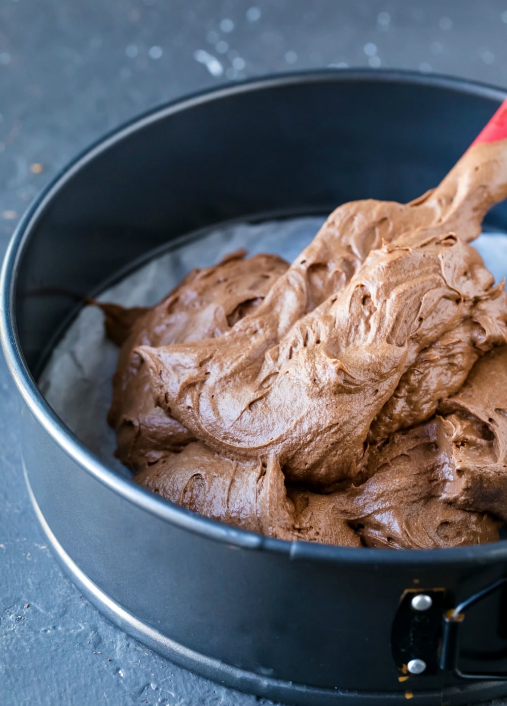 Flourless chocolate cake batter in a springform pan.